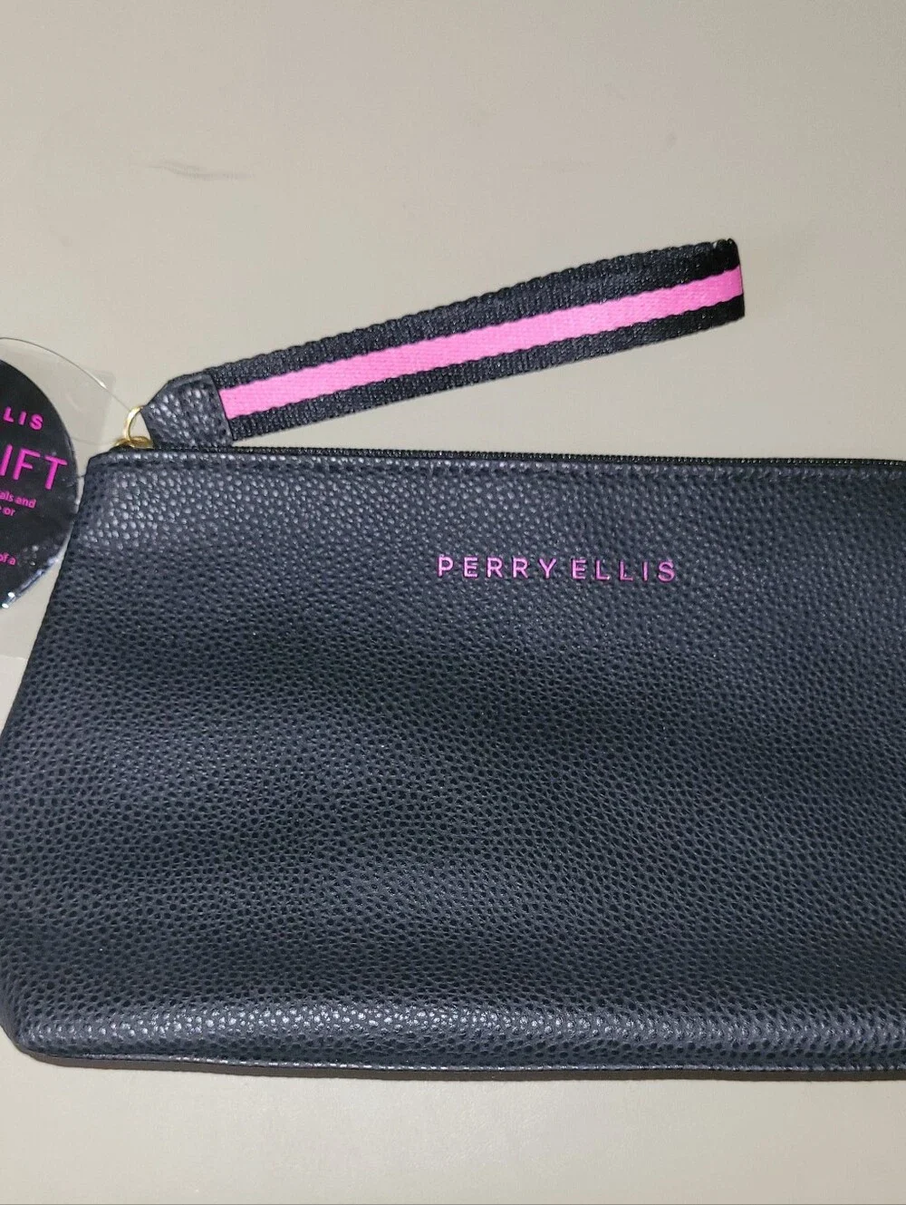 NWT - Perry Ellis Black Wristlet with Pink Trim.